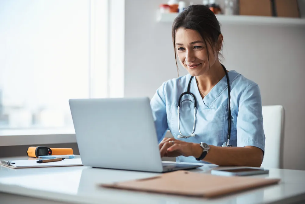 Care4All physician reviewing care options with a patient